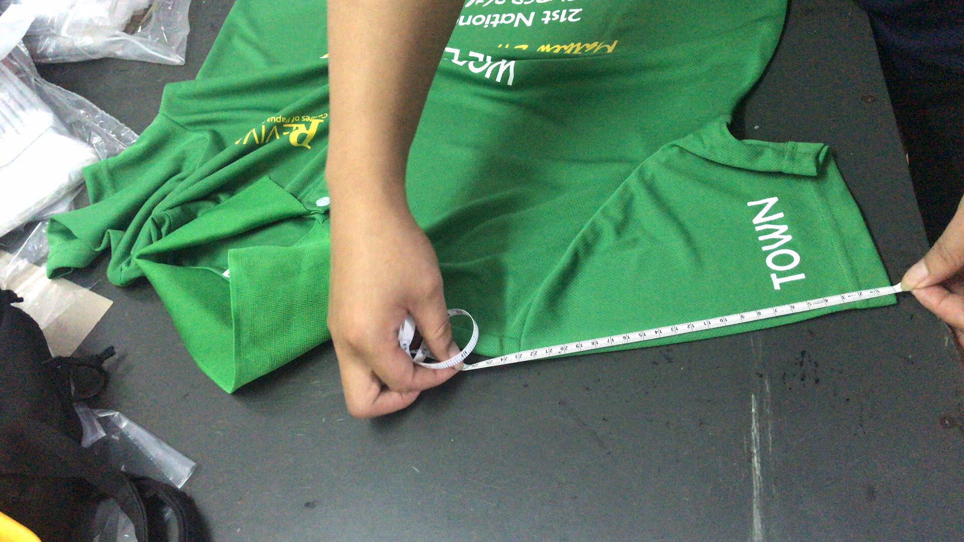 Inspection of custom design t-shirts in China - checking measurements